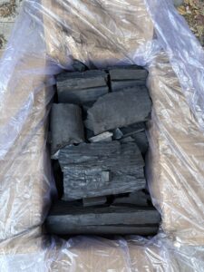 FAQ: Why does Big Ed’s Charcoal have a mix of big and small lumps?